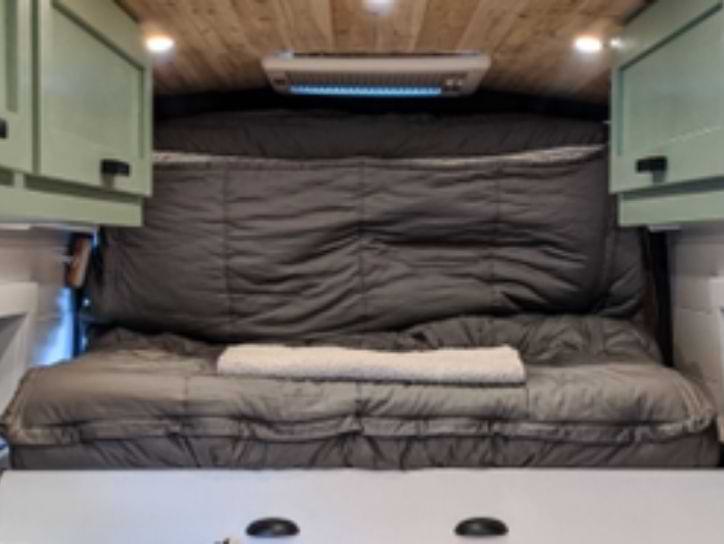 Slide-out platform camper bed